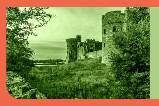A view towards the Carew estuary between a dry stone wall and the ruins of Carew Castle, Pembrokeshire, UK. (Dreamstime)