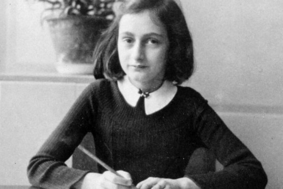 Anne Frank writing at her desk, c1942