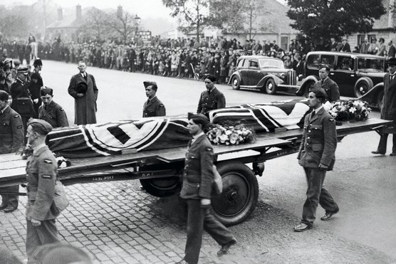 RAF fliers accompany the bodies of two Nazi airmen being taken to be buried in Edinburgh