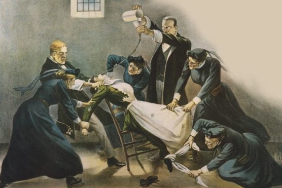 Illustration shows force-feeding of suffragettes