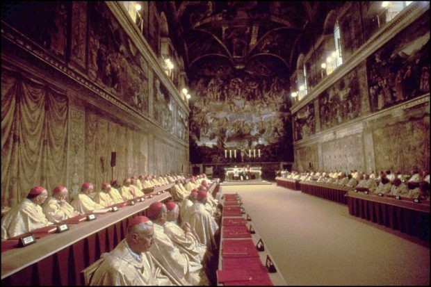 Cardinals, dressed in white, vote in the Sistine Chapel during the papal election of 1978 (Photo via Getty) Cardinals dressed in white sit in rows in the Sistine Chapel