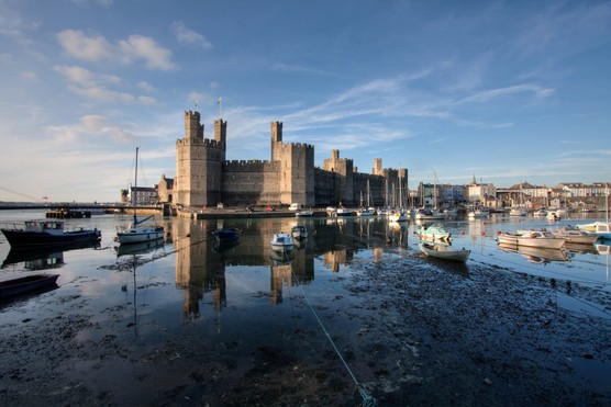 The distinctive polygon towers of Caernarfon Castle. (Photo by Gail Johnson/Getty Images)