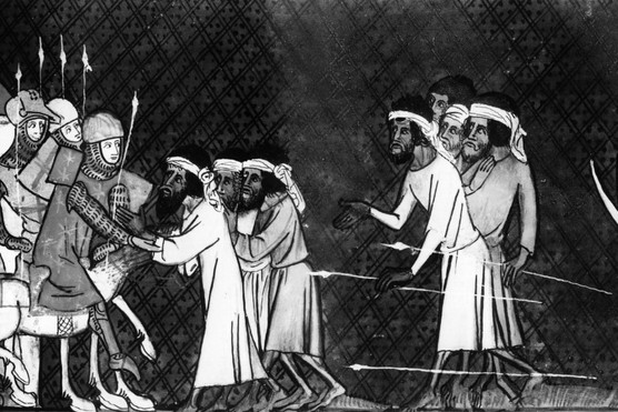 A Saracen attack on Crusaders, from the French manuscript 'Chroniques de Saint Denis', c1200. (Photo by Hulton Archive/Getty Images)