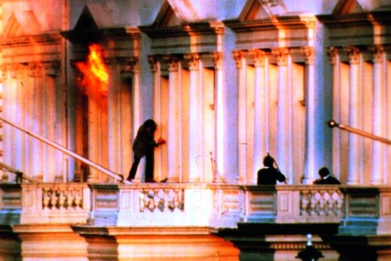 One of the hostages of the Iranian Embassy Siege of 1980 escapes across the balcony (Photo by David Levenson/Keystone/Getty Images)