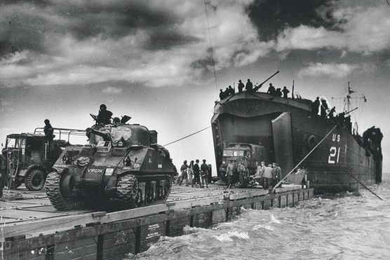 British Army tanks are unloaded on to Gold Beach on D-Day