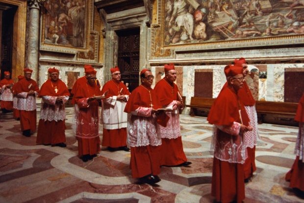 A procession of cardinals file into the Vatican (Photo via Getty) A procession of cardinals file into the Vatican