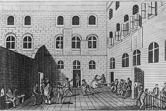 The debtors’ exercise grounds at Newgate prison in 1809. The debtors’ prison was a feature of everyday life in 18th-century England (Photo by Rischgitz/Hulton Archive/Getty Images)