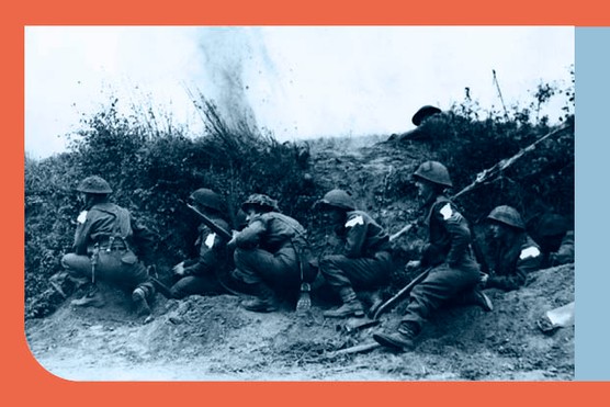 Allied troops hide from enemy shelling during the battle of Caen. The town was finally captured after several weeks of intensive fighting. The white markings on their shoulders were later added to the photograph by a censor to hide the name of the battalion. (Photo by Hulton-Deutsch/Hulton-Deutsch Collection/Corbis via Getty Images)
