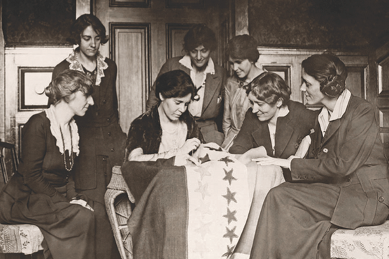 National Woman’s Party activists sew a star onto their ‘ratification flag'